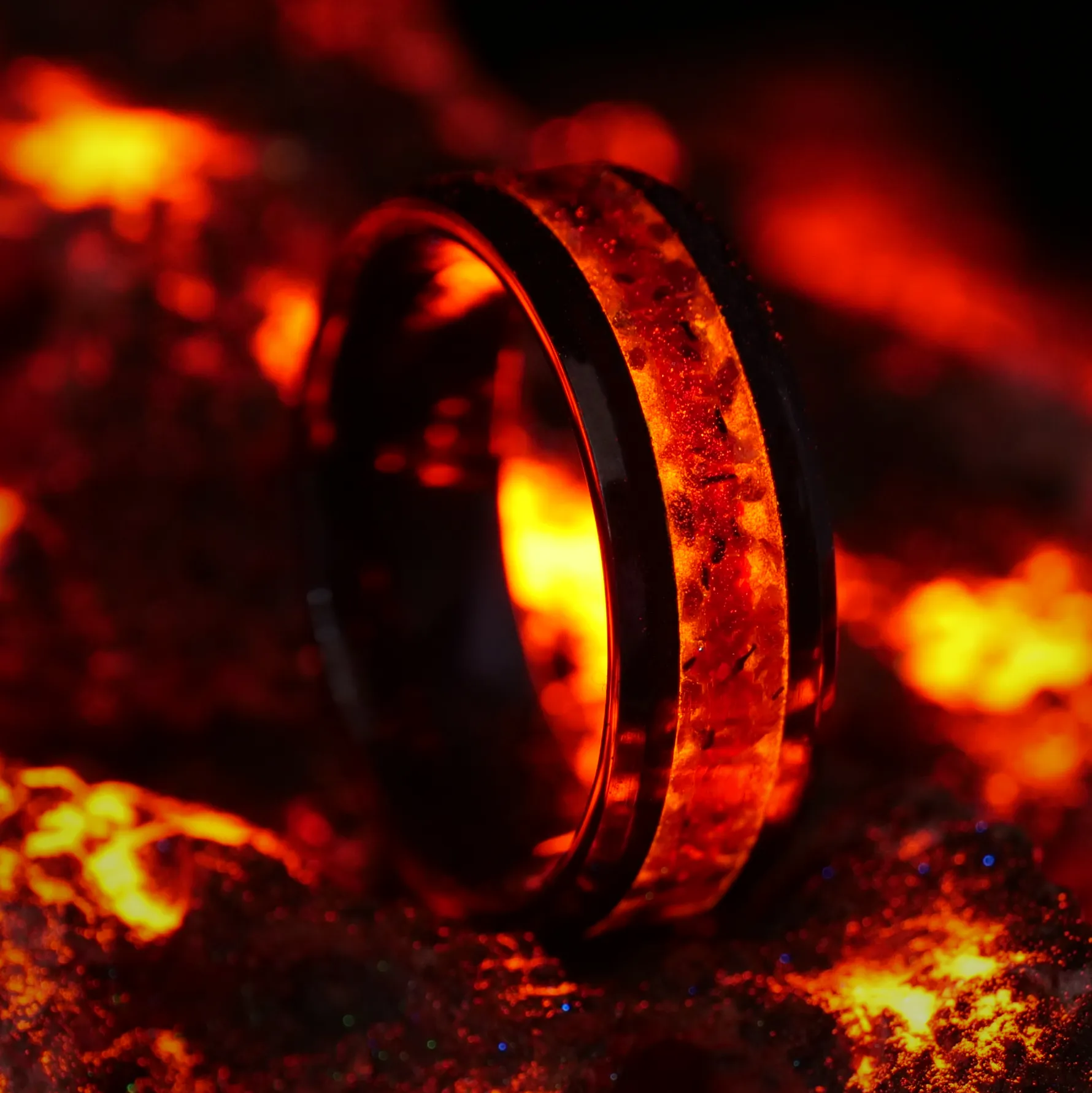 Garnet Lava Pit Glowstone Ring on Black Ceramic